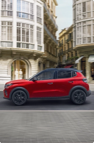 Zijaanzicht van de Citroën ë‑C3 elektrische SUV met toonaangevend comfort voor soepele en betaalbare stedelijke mobiliteit.